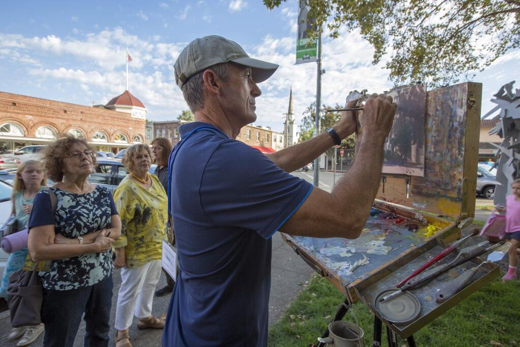 Admirers watched artist Michael Obermeyer work on his painting of First Street East. The 'Quickdraw' part of the Plein Air event in 2017. (Photo by Robbi Pengelly/Index-Tribune)