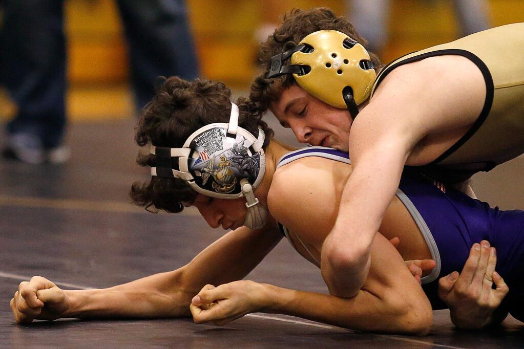 Windsor's Blake Fredrickson, right, defeated Spanish Springs' Devin Griffen in the 106-lbs final match during the King of the Mat wrestling tournament at Windsor High School in Windsor, California, on Saturday, January 20, 2018. (Alvin Jornada / The Press Democrat)