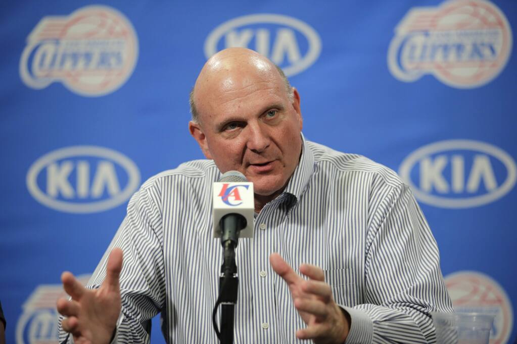 FILE - In this Aug. 18, 2014 file photo, new Los Angeles Clippers owner Steve Ballmer speaks during a news conference held after the Clippers Fan Festival in Los Angeles. Ballmer is stepping down from Microsoftís board, bringing to a close 34 years with the software giant. He says he plans to devote more time to his ownership of the Clippers, civic contributions, teaching and study. (AP Photo/Jae C. Hong, File)