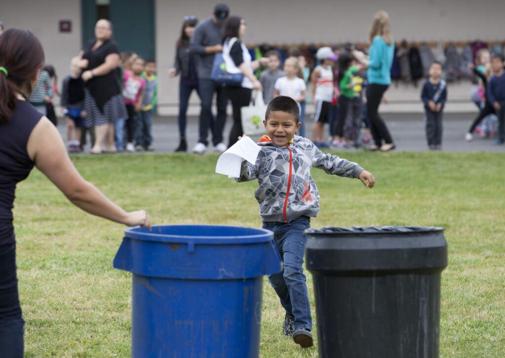 Julian Romero ran straight for the correct waste bin. The Fairmont Sonoma Mission Inn sustainability team hosted a Recycling Olympics for the four kindergarten classes at El Verano Elementary School on Wednesday, 25 May. Each child in the relay team was given an item and had to choose, based on an earlier classroom demonstration, whether to toss it into the recycling bin or the general waste bin. (Photos by Robbi Pengelly/Index-Tribune)