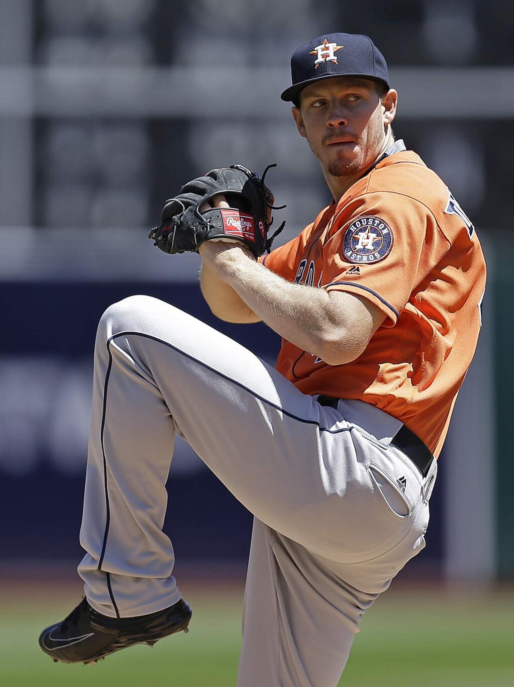 Houston Astros pitcher Chris Devenski works against the Oakland Athletics in the first inning of a baseball game Saturday, April 30, 2016, in Oakland, Calif. (AP Photo/Ben Margot)