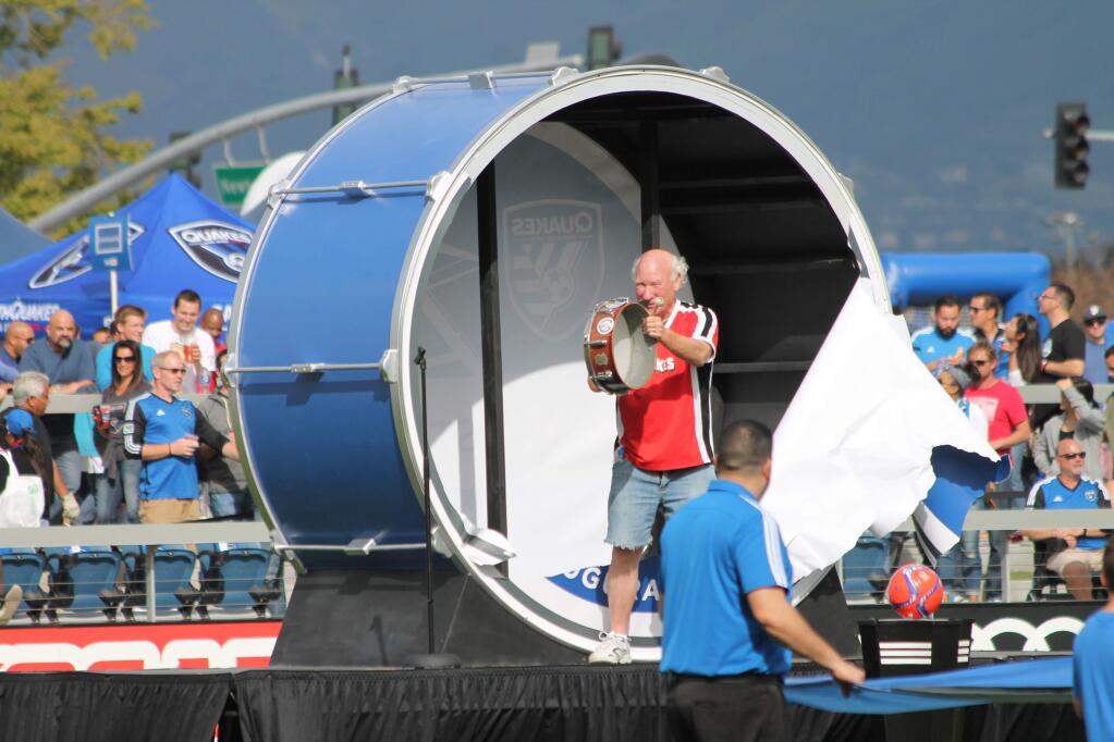 After bursting out of the huge bass drum, Earthquakes fan and cheerleader Krazy George gets the crowd at Avaya Stadium's opening whipped into a proper mood. (Chris Ziemer / For The Press Democrat)