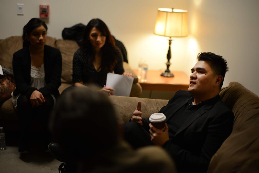 Pulitzer Prize-winning journalist Jose Antonio Vargas, right, chatting backstage before speaking during a post-election conversation about immigration in America at Sonoma State University's Schroeder Hall Sunday evening. He came out as an undocumented immigrant from the Philippines in a New York Times Magazine article he wrote in 2011. January 29, 2017.(Photo: Erik Castro/for The Press Democrat)