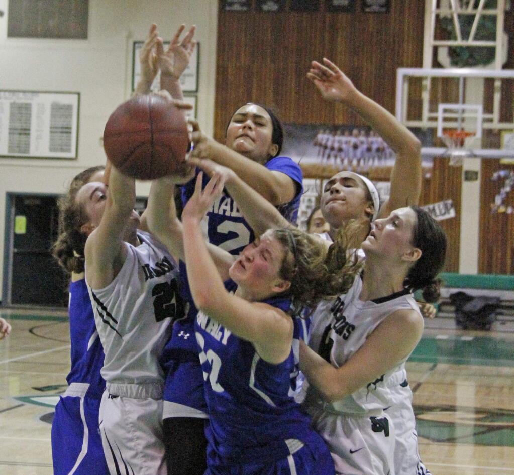 Bill Hoban/Index-TribuneEverybody wants a loose ball during Sonoma's recent game with Analy. The Lady Dragons are waiting to see which seed they're going to be in next week's SCL Tournament.