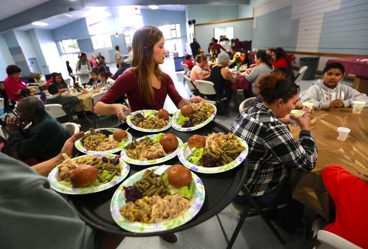 Volunteers fed thousands of people in need during the Great Thanksgiving Banquet at the Sonoma County Fairgrounds on Wednesday, November 26, 2014.Photo by John Burgess/The Press Democrat