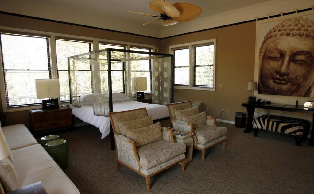 The Gaige Suite offers touches of Asia, in this spacious and very bright Gaige House Inn guest room. The room includes a large private deck overlooking the pool and garden, king bed, fireplace and an oversized bathroom with shower and Jacuzzi bath for two.
