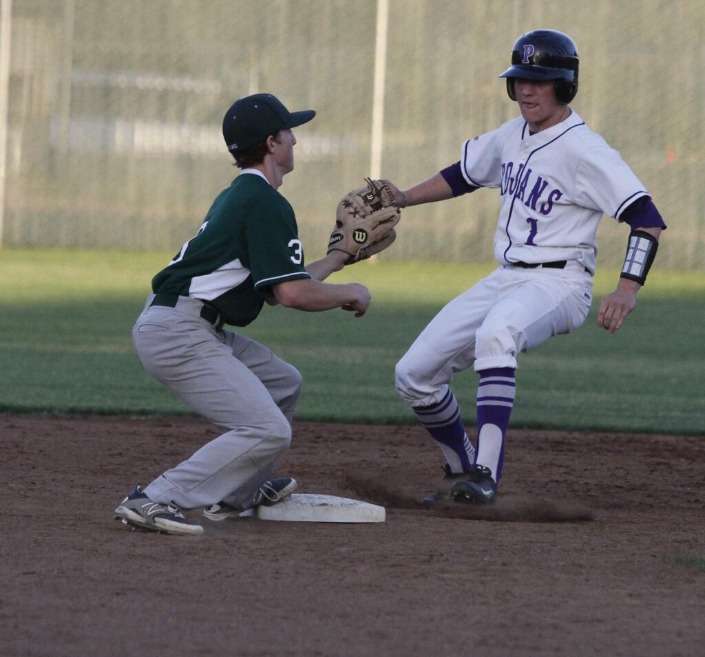 BILL HOBAN/SONOMA INDEX-TRIBUNEPetaluma base runner Luke Wheless has no where to go as he is about to be tagged out by Sonoma Valley's Ethan Vitale. Sonoma beat Petaluma, 2-0, in the SCL Tournament.