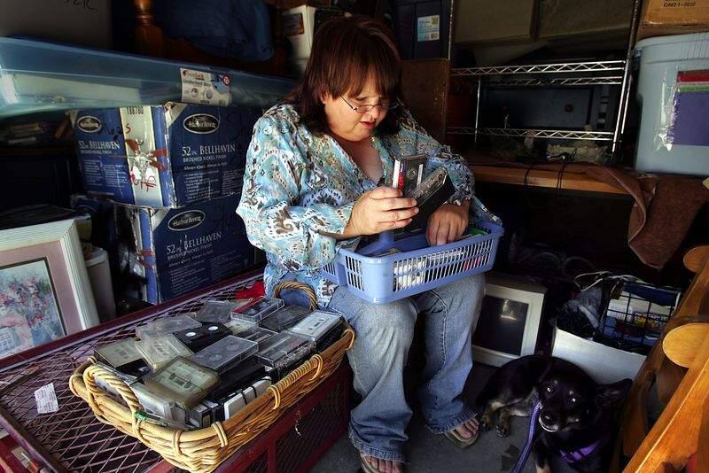 1 of 4__ Petaluma resident Wendy Hutchens searches through tapes in her Roseville, CA storage unit for recording of conversations she says are from early 2001 with the suspected killer of JonBenet Ramsey, John Mark Karr. The Press Democrat/John Burgess
