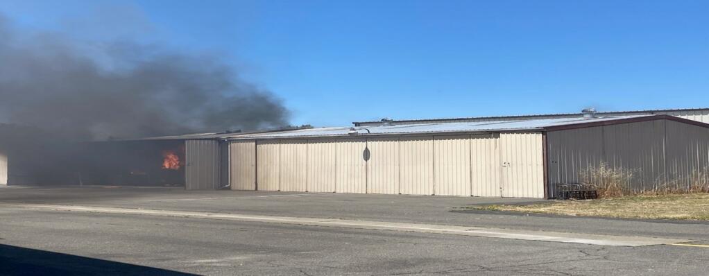 Petaluma Airport hangar in flames Monday afternoon. (COURTESY OF BATTALION CHIEF KEVIN WEAVER)