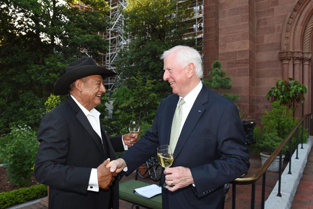 Reynaldo Robledo is greeted by Rep. Mike Thompson (D-St. Helena) at last month's Winemakers Dinner at the Smithsonian.