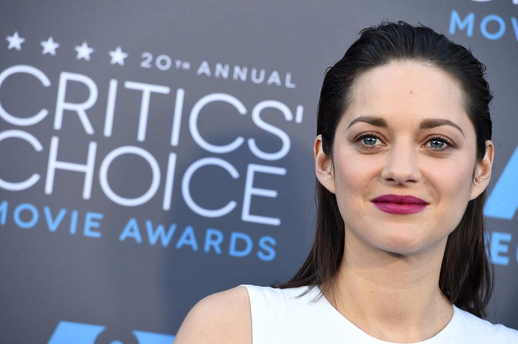 Marion Cotillard arrives at the 20th annual Critics' Choice Movie Awards at the Hollywood Palladium on Thursday, Jan. 15, 2015, in Los Angeles. (Photo by Jordan Strauss/Invision/AP)