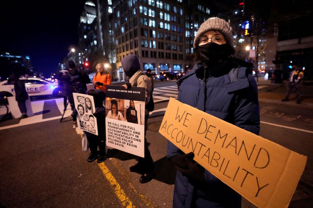 Demonstrators protest Friday, Jan. 27, 2023, in Washington, over the death of Tyre Nichols, who died after being beaten by Memphis police officers on Jan. 7. (AP Photo/Manuel Balce Ceneta)