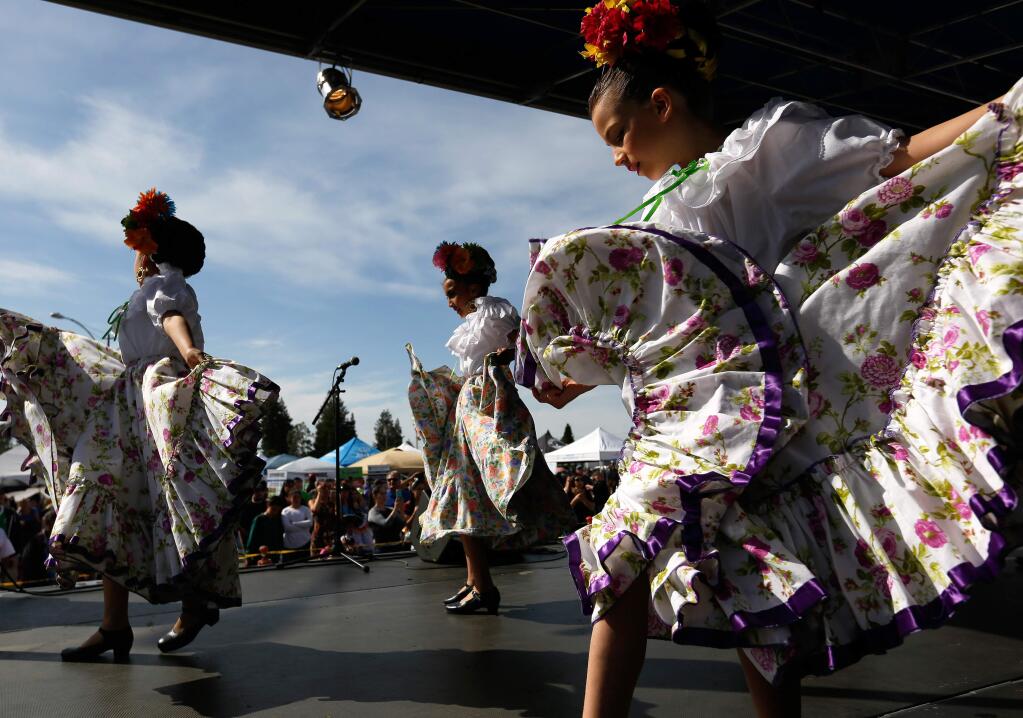 Dancers from Ballet Folklorico Netzahuacoyotl perform during the Roseland Cinco de Mayo celebration in Santa Rosa on Friday, May 5, 2017. (ALVIN JORNADA/ PD)