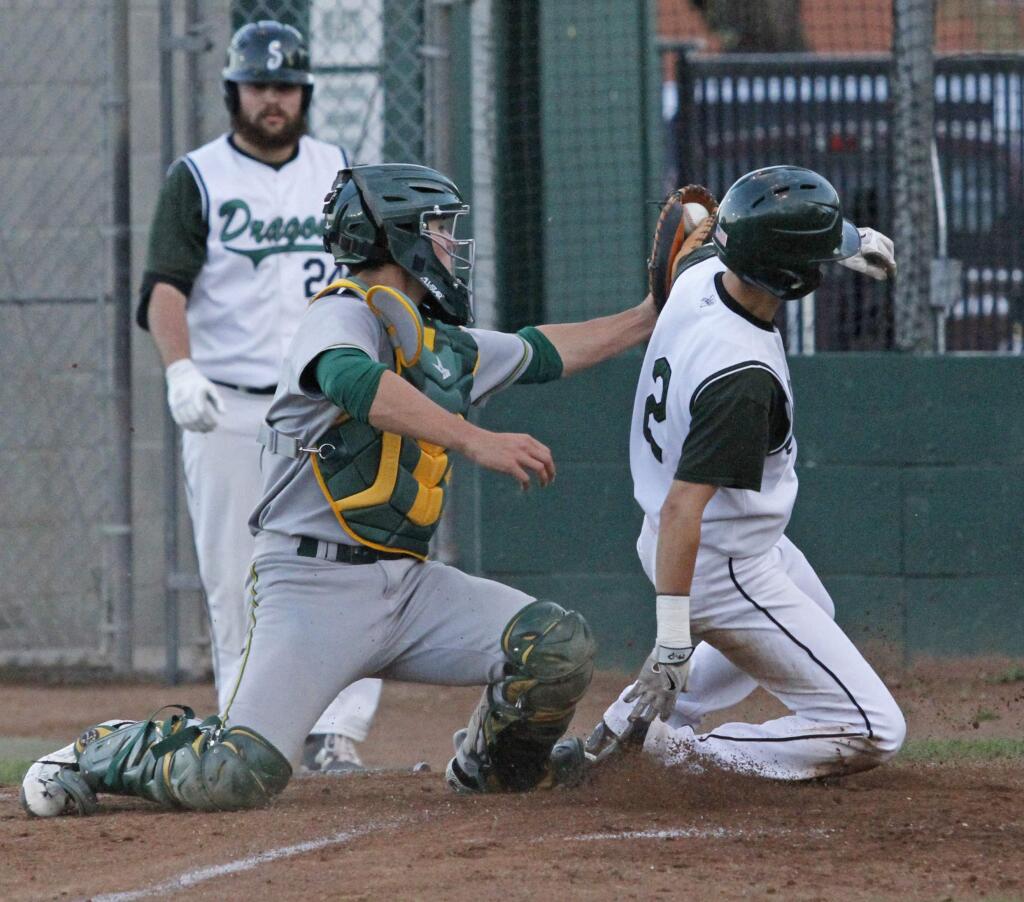 Bill Hoban/Index-TribuneSonoma's Nico DeTorres gets tagged out in a play at the plate during Wednesday night's game against San Marin.