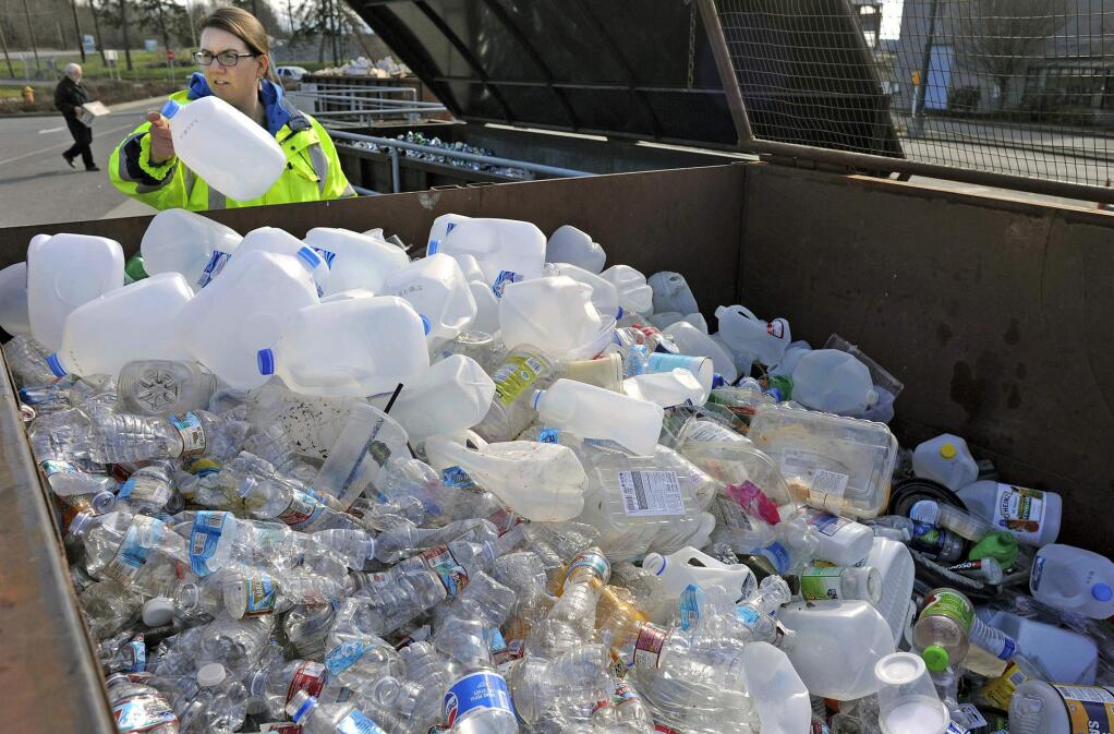 Plastic overlows from a recycling bin in Mount Vernon, Washington (SCOTT TERRELL / Skagit County Herald)