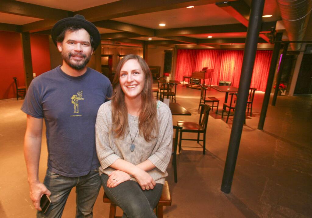 Roger Tschann and Amber Driscoll, owners of Speakeasy restaurant on Putnam Plaza, in their bar and music venue Big Easy across American Alley from their restaurant in downtown Petaluma on tuesday December 23, 2014. (SCOTT MANCHESTER/ARGUS-COURIER STAFF)