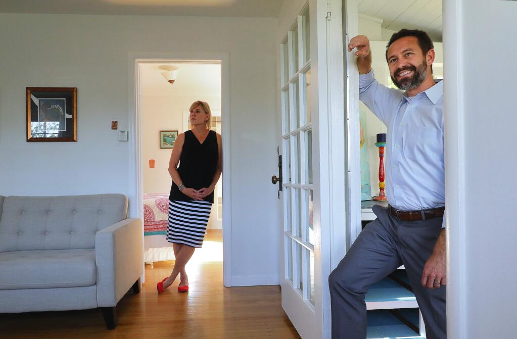 Coldwell Banker Residential Brokerage agent Jeremy King, right, is helping homeowner Marsha Walters sell her two bedroom/one bathroom cottage in Petaluma listed for $672,000. (CHRISTOPHER CHUNG/ PD)