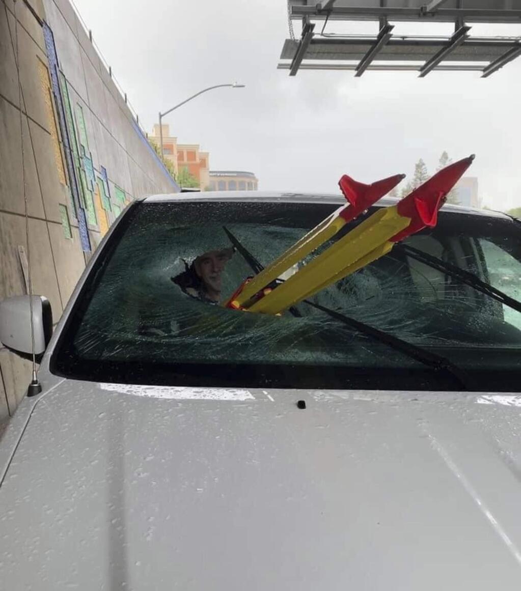 In this Thursday, May 16, 2019, photo released by El Dorado Veterans Resources/Military Family Support Group (MFSG) shows a stolen tripod from a California Department of Transportation crew, that was dropped from an overpass onto a Sacramento freeway, impaling the lung of a passenger riding on a El Dorado Veterans Resources, EDVR's van in Sacramento, Calif. The driver of the van, Tim Page, tells KCRA-TV that he was on Interstate 5 Thursday morning when the yellow-and-red tripod smashed through the glass. The passenger survived but with broken ribs and a partially punctured lung. (Tim Page/El Dorado Veterans Resources Transportation/Military Family Support Group via AP)