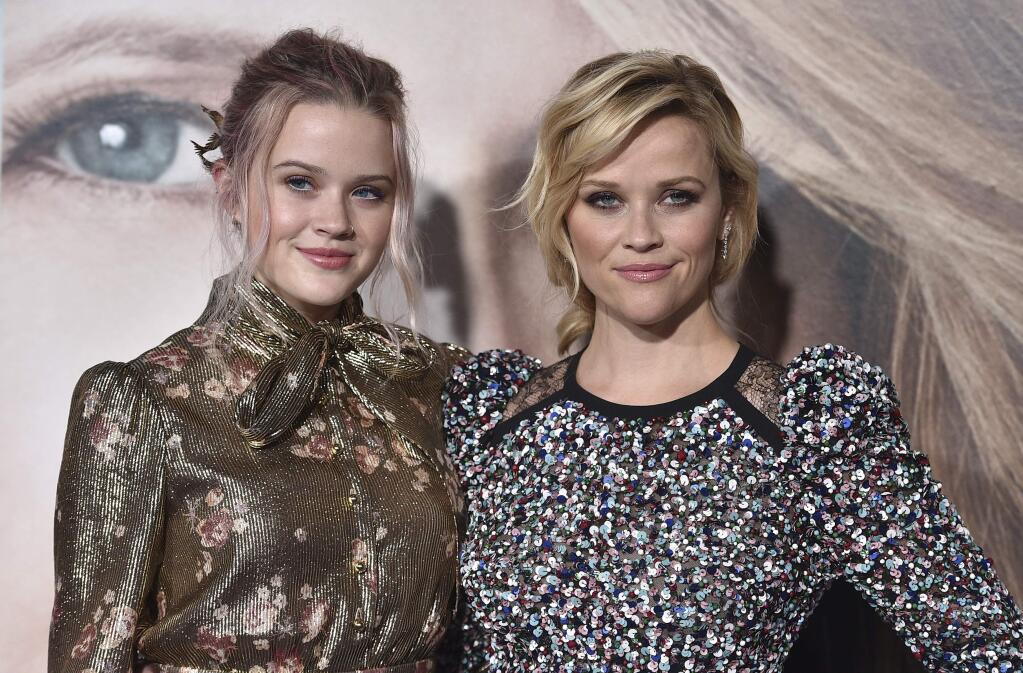 Ava Phillippe, left, and Reese Witherspoon arrive at the Los Angeles premiere of 'Big Little Lies' at the TCL Chinese Theatre on Tuesday, Feb. 7, 2017. (Photo by Jordan Strauss/Invision/AP)