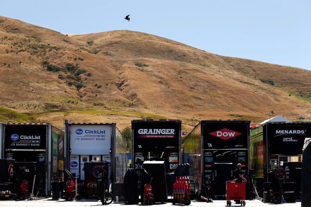 Race crews unload equipment from their transport trucks in preparation for the NASCAR Monster Energy Cup Series Toyota/Save Mart 350 race at Sonoma Raceway on Thursday, June 21, 2018. (Alvin Jornada / The Press Democrat)