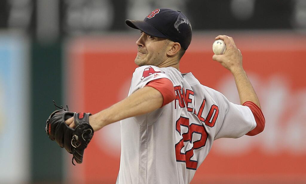 In this Sept. 3, 2016, file photo, Boston Red Sox pitcher Rick Porcello works against the Oakland Athletics in the first inning. (AP Photo/Ben Margot, File)