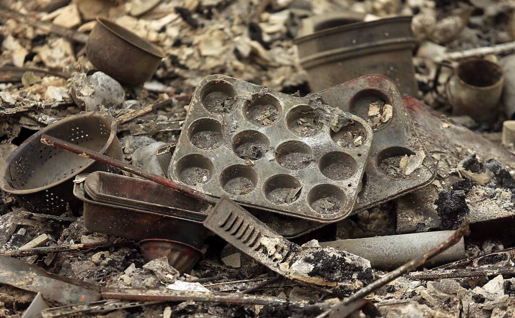 Cooking utensils from a burnt home in Hidden Valley Lake off Stonegate street, Sunday Sept. 13, 2015. (Kent Porter / Press Democrat) 2015
