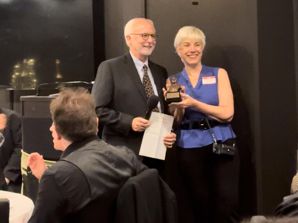 Frederick Weisel attended the 2023 Nero Awards in New York last December, where he was presented with top prize for the mystery novel “The Day He Left” by Stephannie Culbertson, Chair of Nero Award Committee (Chelsea Weisel)