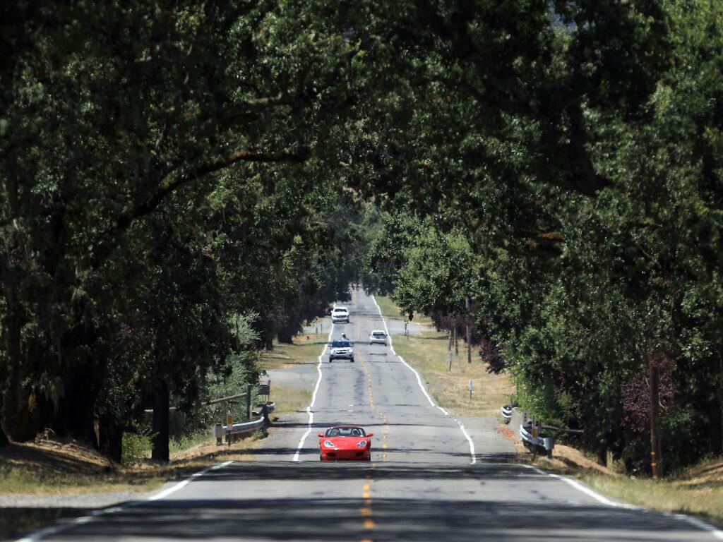 Cars seem to keep a safe distance on a long stretch of Highway 128 connecting Sonoma County to the Napa Valley, Thursday, July 18, 2019. (Kent Porter / The Press Democrat) 2019