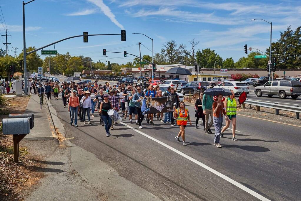 Bay Area-based animal rights group Direct Action Everywhere staged its second such event in the county in the past three months when participants walked from Petaluma's Liberty Cemetery to Petaluma Farms on Cavanaugh Lane on Sunday, July 29, 2018. Photos courtesy Michael Goldberg.