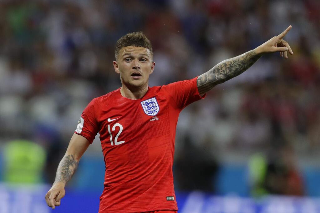 England's Kieran Trippier points during the group G match against Tunisia at the 2018 soccer World Cup in the Volgograd Arena in Volgograd, Russia, Monday, June 18, 2018. (AP Photo/Alastair Grant)