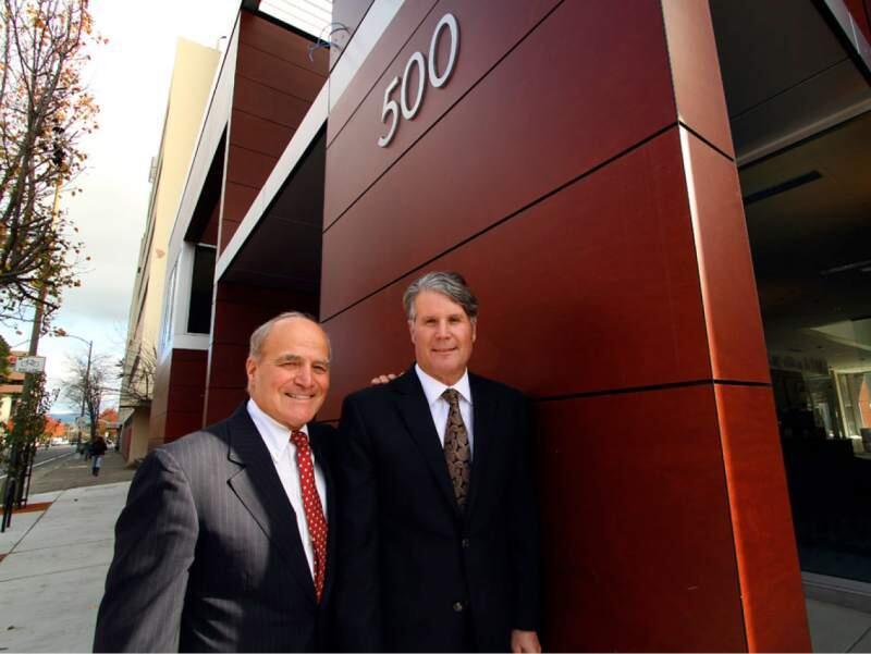 John Biggs, CEO and president of Luther Burbank Savings, with Victor Trione, a major shareholder and co-founder. (Photo courtesy Luther Burbank Savings)