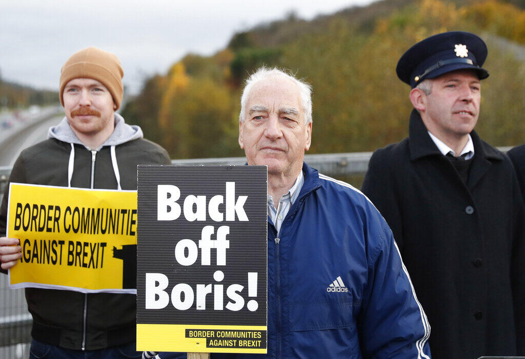 Demonstrators gathered at Carrickcarnon, Ireland to oppose British Prime Minister Boris Johnson’s threat to close the border between Ireland and Northern Ireland. (PETER MORRISON / Associated Press)