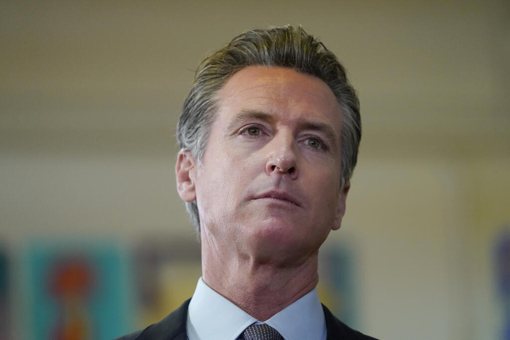 Gov. Gavin Newsom speaks during a news conference at James Denman Middle School in San Francisco, Friday, Oct. 1, 2021. (AP Photo/Jeff Chiu)
