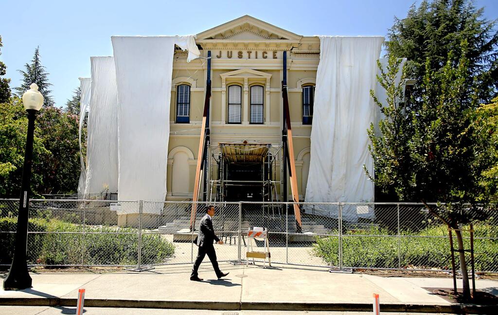 Napa's downtown courthouse remains damaged and fenced off a year after a 6.0 earthquake damaged portions of the Napa Valley, Wednesday Aug. 19, 2015. (Kent Porter / Press Democrat) 2015