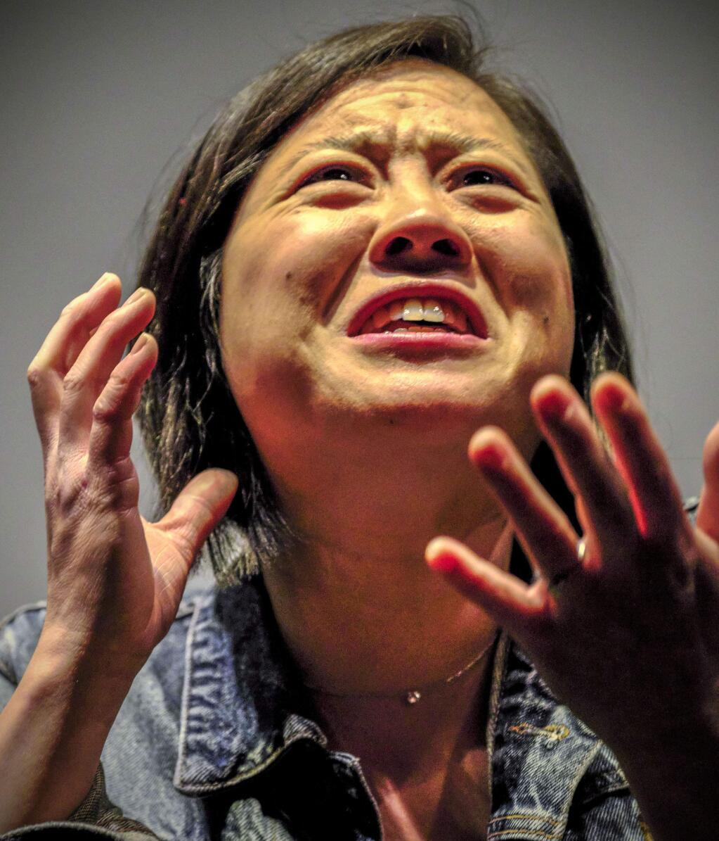 Susan Lieu performs her one-woman show “140 lbs: How Beauty Killed My Mother,” May 19 at The Marsh in San Francisco. (JEFF KAN LEE)