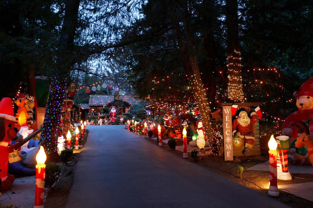 Gary Rasche's forest of inflatable and other lighted Christmas decorations at his home on Montecito Avenue, in Santa Rosa, California on Tuesday, December 19, 2017. (Alvin Jornada / The Press Democrat)