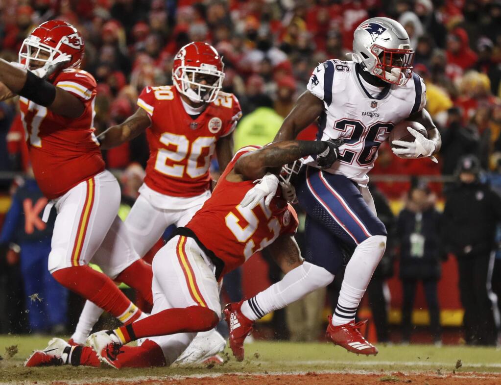 New England Patriots running back Sony Michel (26) runs to the end zone for a touchdown during the first half of the AFC Championship NFL football game against the Kansas City Chiefs, Sunday, Jan. 20, 2019, in Kansas City, Mo. (AP Photo/Jeff Roberson)