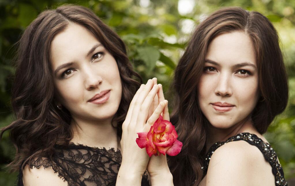 Twin pianists Christina and Michelle Naughton were born in Princeton, N.J., butgrew up in Madison, Wis. They began playing the piano at age 4, initially taughtby their mother, an amateur pianist.