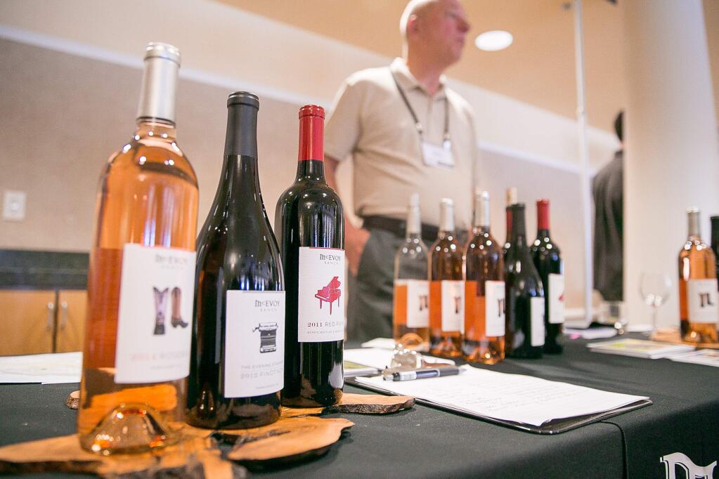 The McEvoy Ranch wine table at the Petaluma Gap's inaugural WIND to WINE Festival at the Sheraton Petaluma on Saturday, August 8, 2015. (RACHEL SIMPSON/FOR THE ARGUS-COURIER)