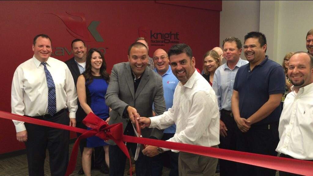 Former Petaluma City Councilman, Mike Harris, far left, and holding the scissors, Kavaliro President Mike Moore, left, and Chief Operating Officer Mike Mahony lead the opening of the Orlando-based staffing company's expanded new Petaluma office on Southpoint Boulevard on Wednesday, July 15, 2015. (Kavaliro)