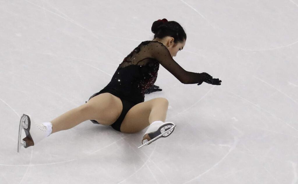 Karen Chen of the United States falls during the women's free figure skating final in the Gangneung Ice Arena at the 2018 Winter Olympics in Gangneung, South Korea, Friday, Feb. 23, 2018. (AP Photo/Morry Gash)