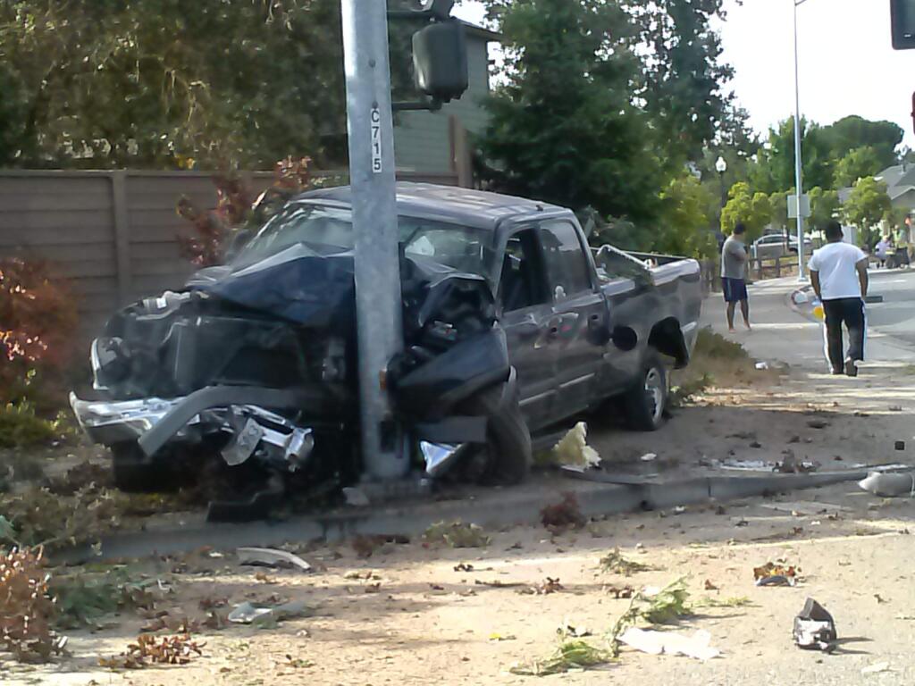 A 46-year-old man was arrested on suspicion of driving under the influence of drugs after crashing his pickup into a traffic signal pole Wednesday at Marlow Road and West Steele Lane. (Photo by Anthony Zamora)