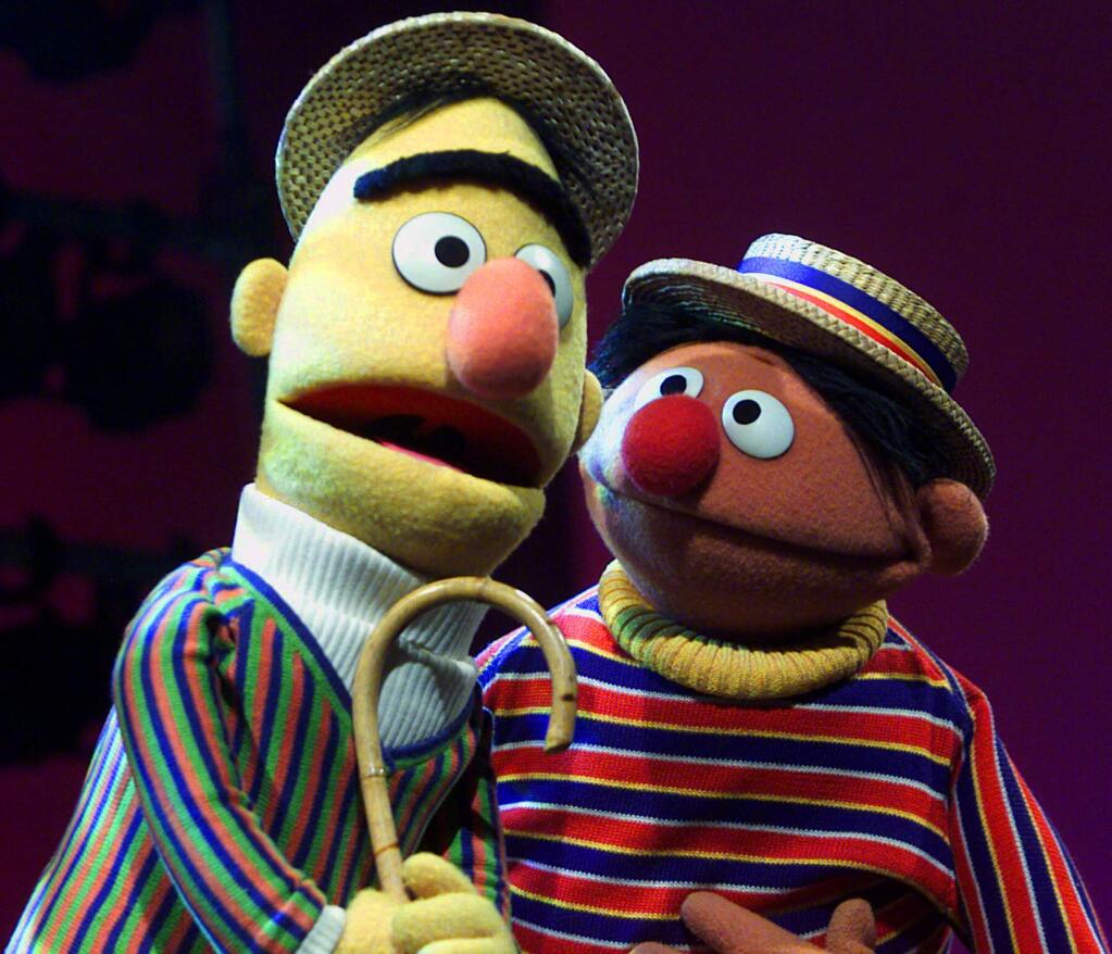 FILE - In this Aug. 22, 2001, file photo, Muppets Bert, left, and Ernie, from the children's program 'Sesame Street,' are shown in New York. Under a new partnership announced Thursday, Aug. 13, 2015, by Sesame Workshop and HBO, the premium cable channel will carry the next five seasons of 'Sesame Street' on HBO and its related platforms. PBS, the long-time home of the children's program, will continue to air the show as well. (AP Photo/Beth A. Keiser, File)