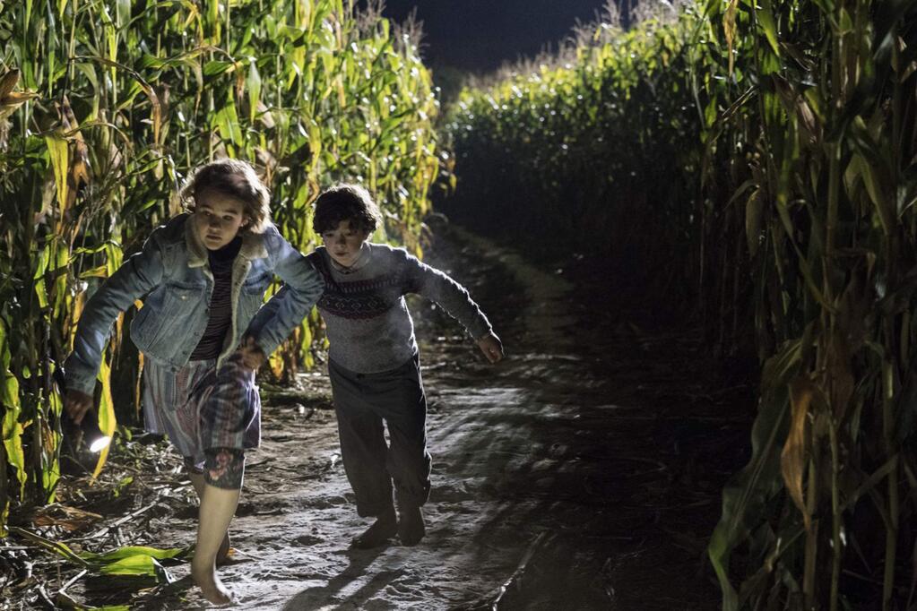 Millicent Simmonds as Regan Abbott and Noah Jupe as Marcus Abbott in the horror thriller 'A Quiet Place.' (Paramount Pictures)