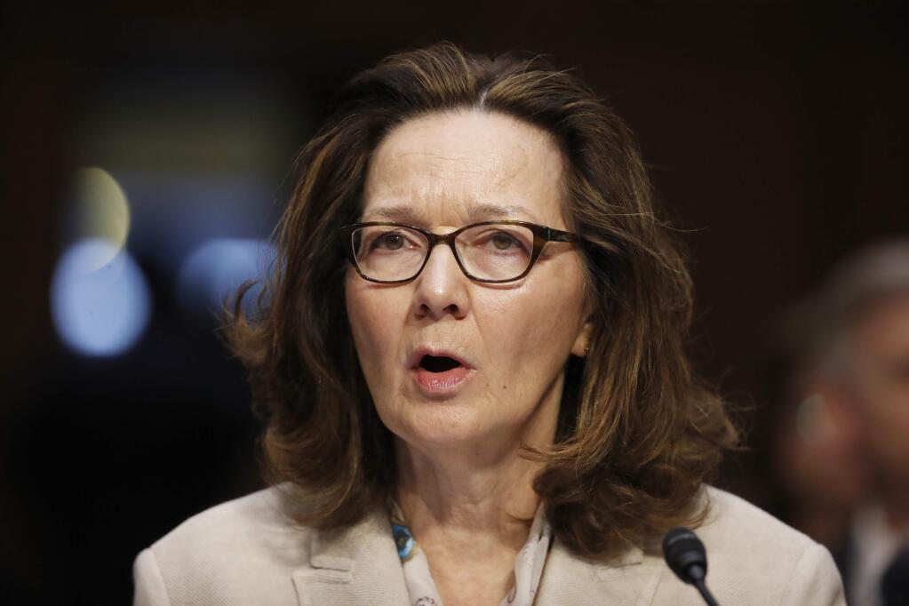 FILE - In this May 9, 2018, file photo, CIA nominee Gina Haspel testifies during a confirmation hearing of the Senate Intelligence Committee on Capitol Hill in Washington. The political schism in the Democratic Party is playing out in the vote for Haspel, as support from red-state senators facing re-election is bumping up against a more liberal flank eyeing potential 2020 presidential bids who reject of the nominee over the agency‚Äôs clouded history of torture. (AP Photo/Alex Brandon, File)