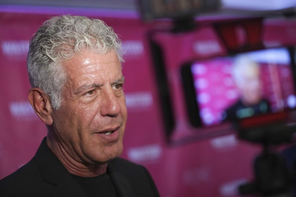 FILE - In this Oct. 5, 2017 file photo, Executive Producer and narrator chef Anthony Bourdain attends the premiere of 'Wasted! The Story of Food Waste' at the Alamo Drafthouse Cinema in New York. Bourdain has been found dead in his hotel room in France, Friday, June 8, 2018, while working on his CNN series on culinary traditions around the world. (Photo by Brent N. Clarke/Invision/AP, File)