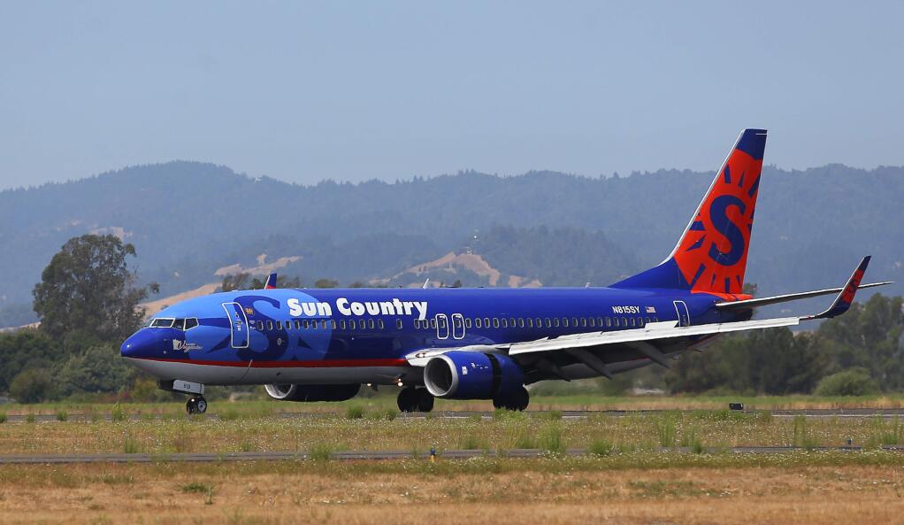 The first Sun Country Airlines flight from Minneapolis arrives at the Charles M. Schulz-Sonoma County Airport in Santa Rosa on Thursday, Aug. 24, 2017. (Christopher Chung/ The Press Democrat)