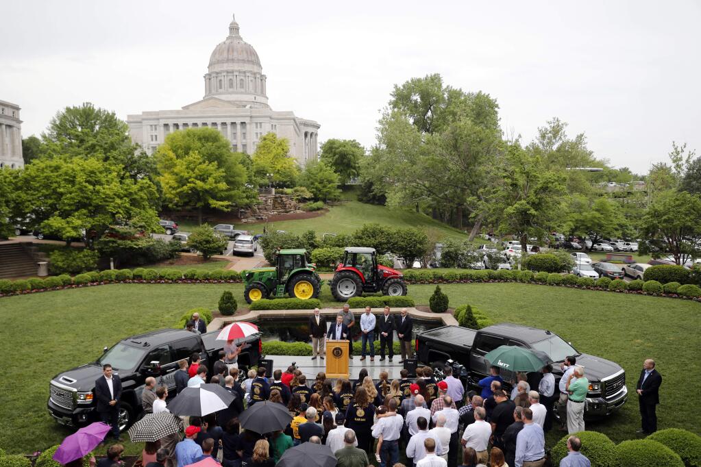 Missouri Gov. Eric Greitens speaks to a small group of supporters announcing the release of funds for the state's biodiesel program Thursday, May 17, 2018, in Jefferson City, Mo. (AP Photo/Jeff Roberson)