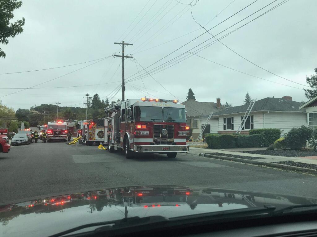 Emergency crews respond to a house fire in southwest Petaluma on Wednesday, Aug. 28, 2019. (TIM LYONS)