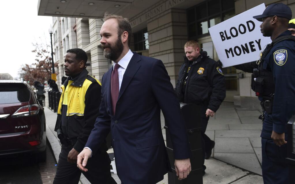 Rick Gates leaves federal court in Washington, Friday, Feb. 23, 2018. Gates, a former top adviser to President Donald Trump's election campaign pleaded guilty to federal conspiracy and false-statements charges in the special counsel's Russia investigation. (AP Photo/Susan Walsh)
